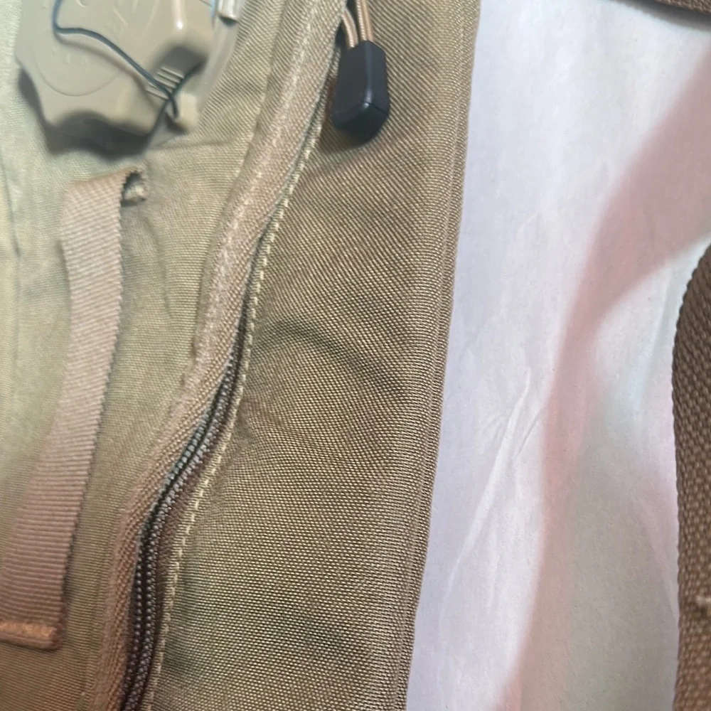 Tan Backpack with Padded Straps and Durable Fabric